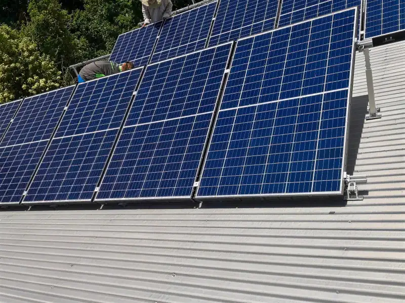 Close up of solar panels installed by RS Energy on a metal roof